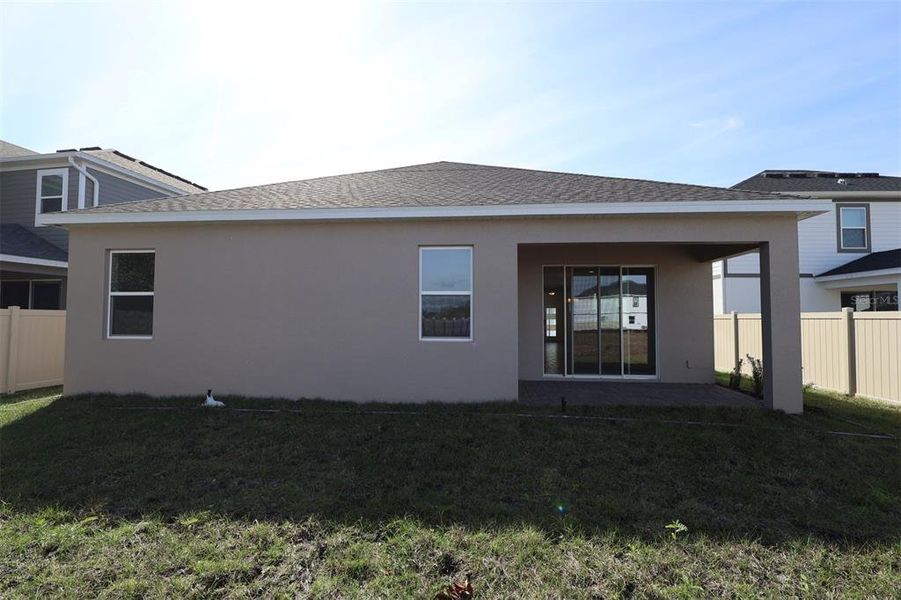 Exterior details and patio area of a home in Bay Lake Farms, St. Cloud (Image 3).