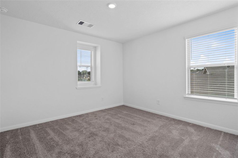 Spacious, unfurnished interior of a new home in Oakwood Trails, Tomball (Image 20).
