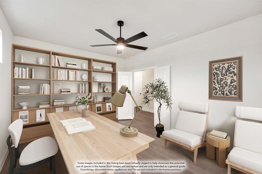 Home office with wood desk, built-in bookshelves, ceiling fan, and hardwood floors Home office with wood desk, built-in bookshelves, ceiling fan, and hardwood floors
