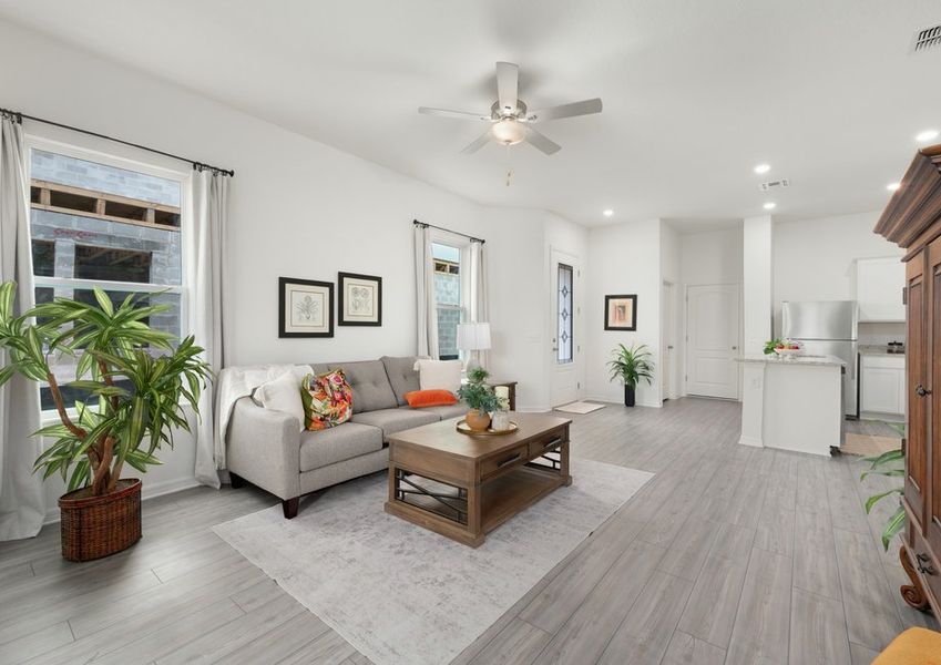 Windows let in plenty of natural light to this family room.
