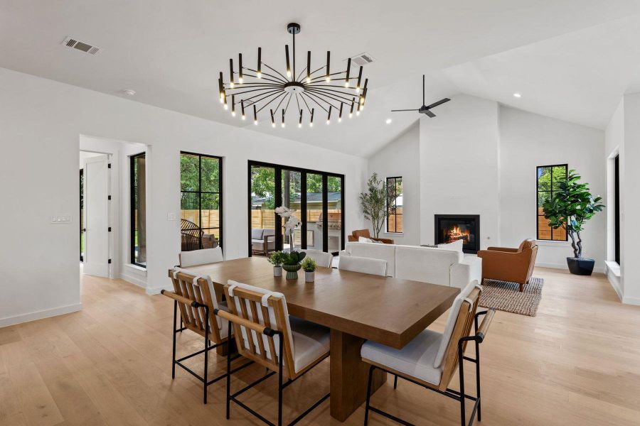 An open concept living space presents generous proportions for both dining and relaxation. An open concept living space presents generous proportions for both dining and relaxation.