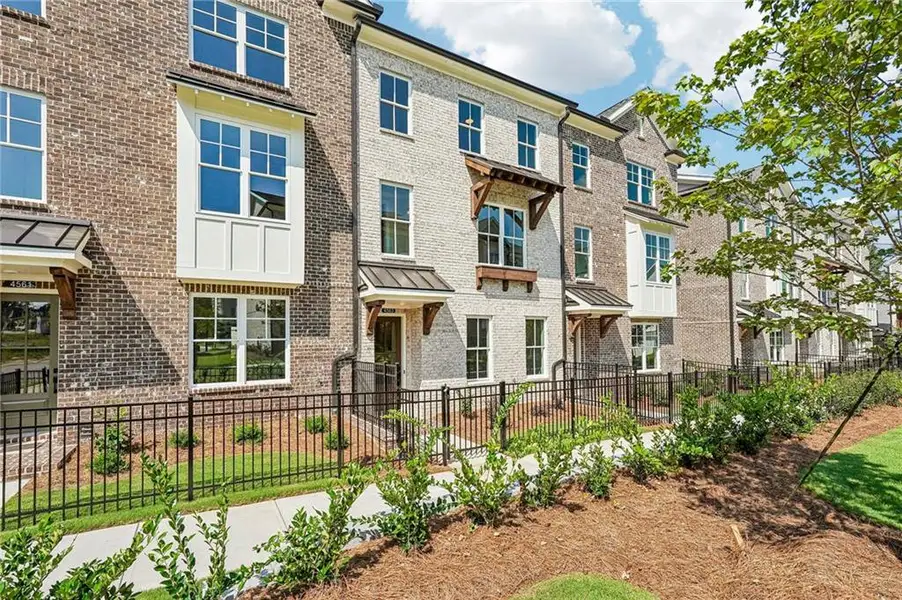 Exterior details and patio area of a home in Townes 333, Peachtree Corners (Image 4).