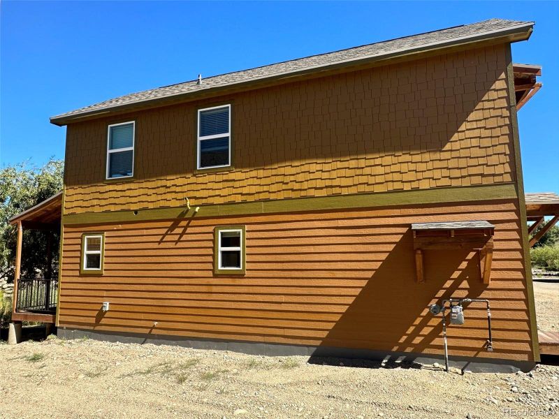 Exterior details and patio area of a home in , Granby (Image 3).