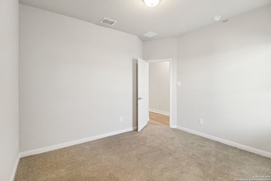 Spacious, unfurnished interior of a new home in Magnolia Village North, San Antonio (Image 22).