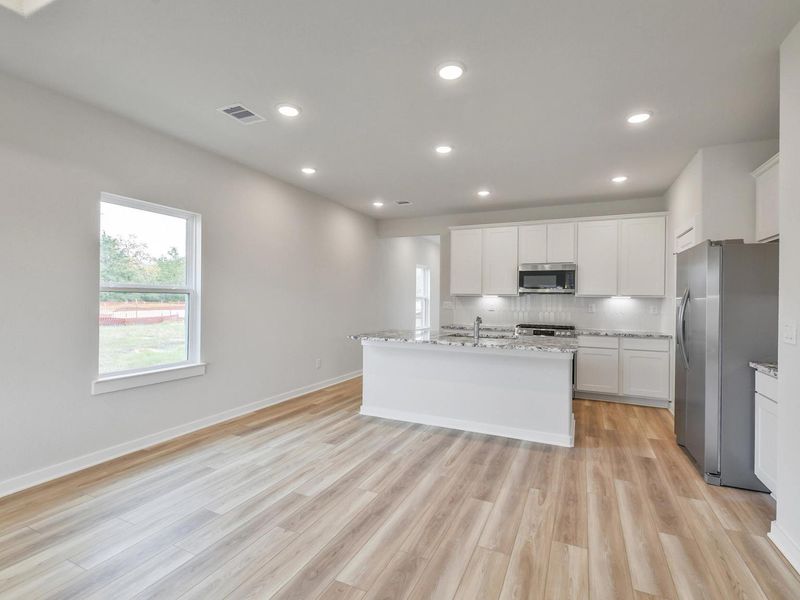 Furnished interior view inside a new home in Windmill Estates, Magnolia (Image 9).