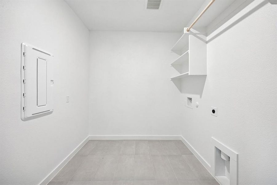 Utility Room in the Heisman home plan by Trophy Signature Homes – REPRESENTATIVE PHOTO