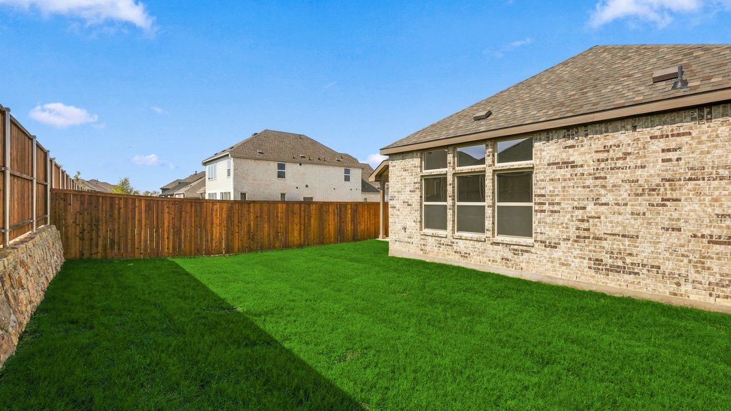 Exterior details and patio area of a home in Wildflower Ranch, Fort Worth (Image 21). Exterior details and patio area of a home in Wildflower Ranch, Fort Worth (Image 21).