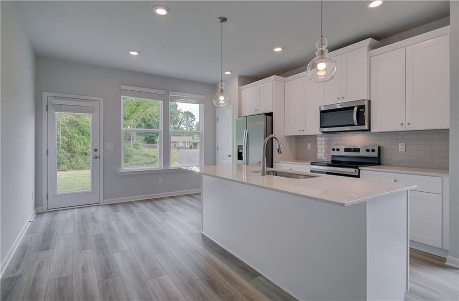 Furnished interior view inside a new home in Enclave at Evergreen, Fairburn (Image 6).