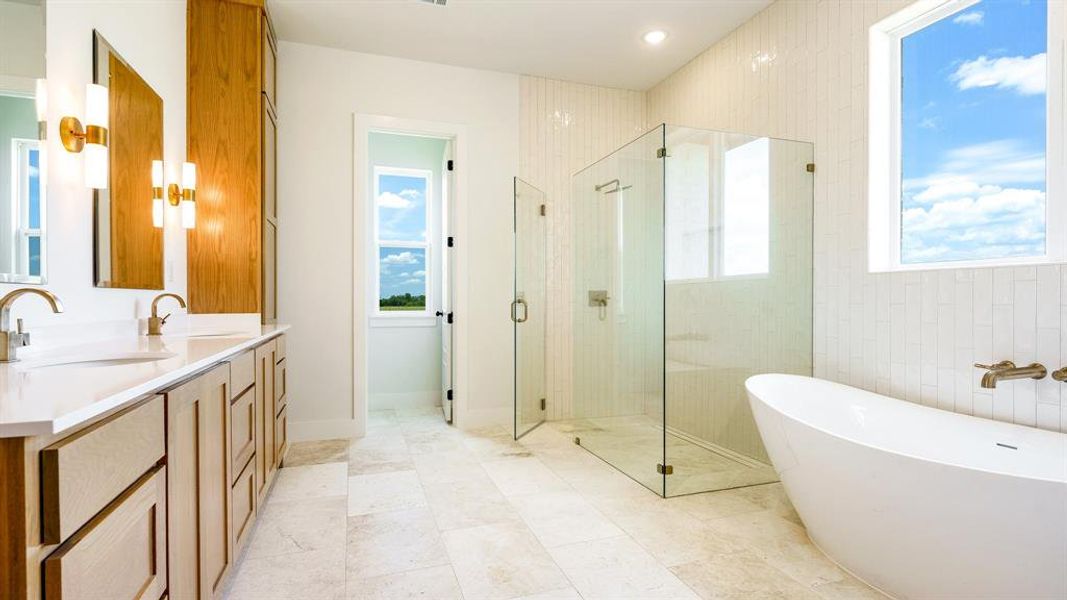 Bathroom with vanity, independent shower and bath, and tile patterned floors