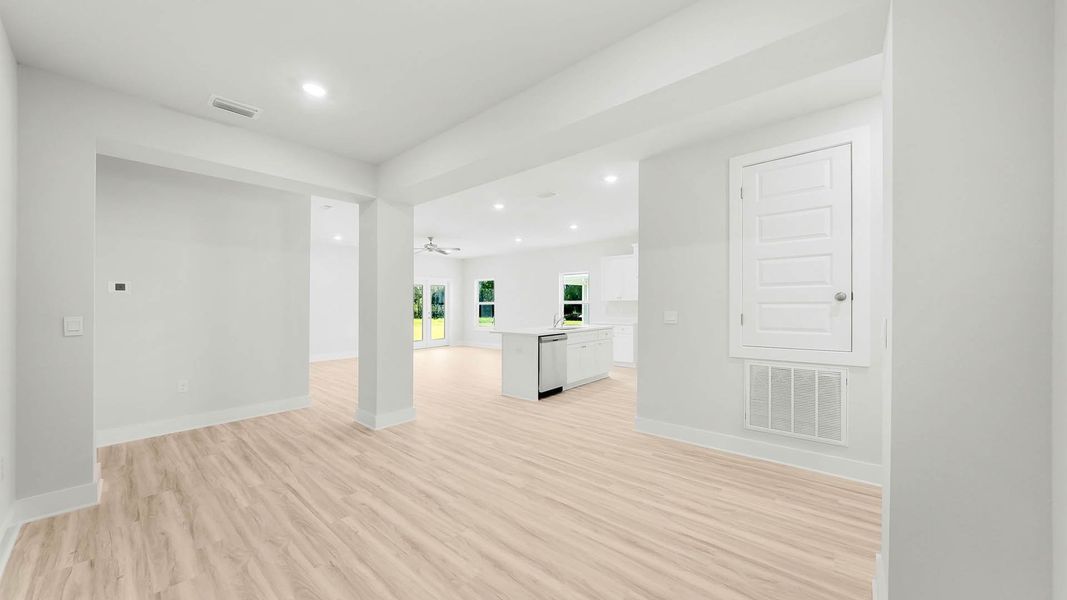 Representative unfurnished interior of a home built from the The Kennedy by D.R. Horton in Titus Park, Panama City (Image 13).