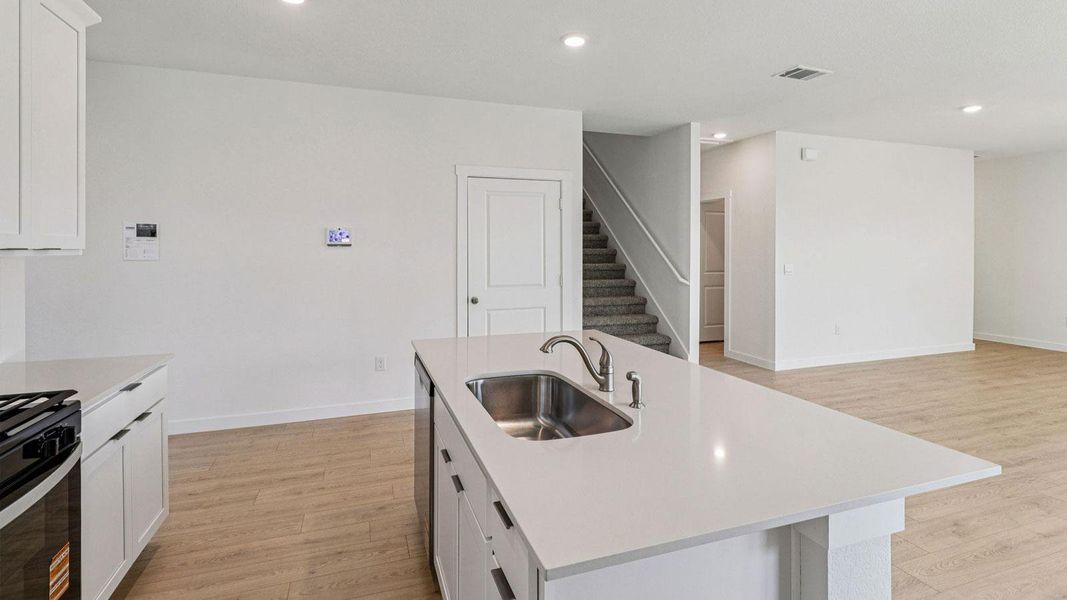 Furnished interior view inside a new home in Monarch Ranch, Manor (Image 9).