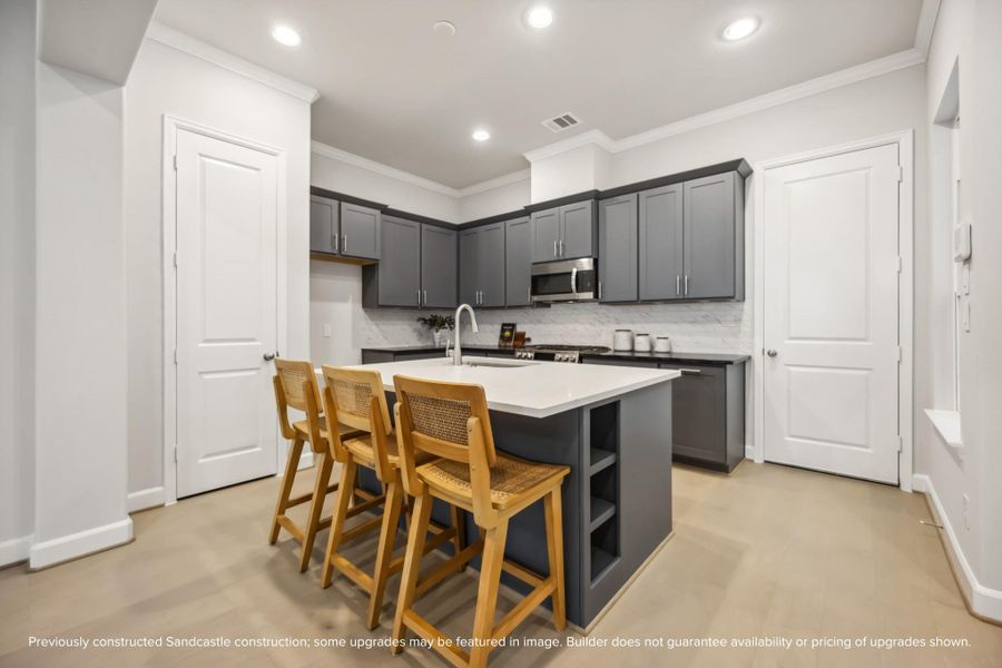 Elevate your culinary adventures with custom cabinets, premium LG stainless steel appliances, and a natural gas range.