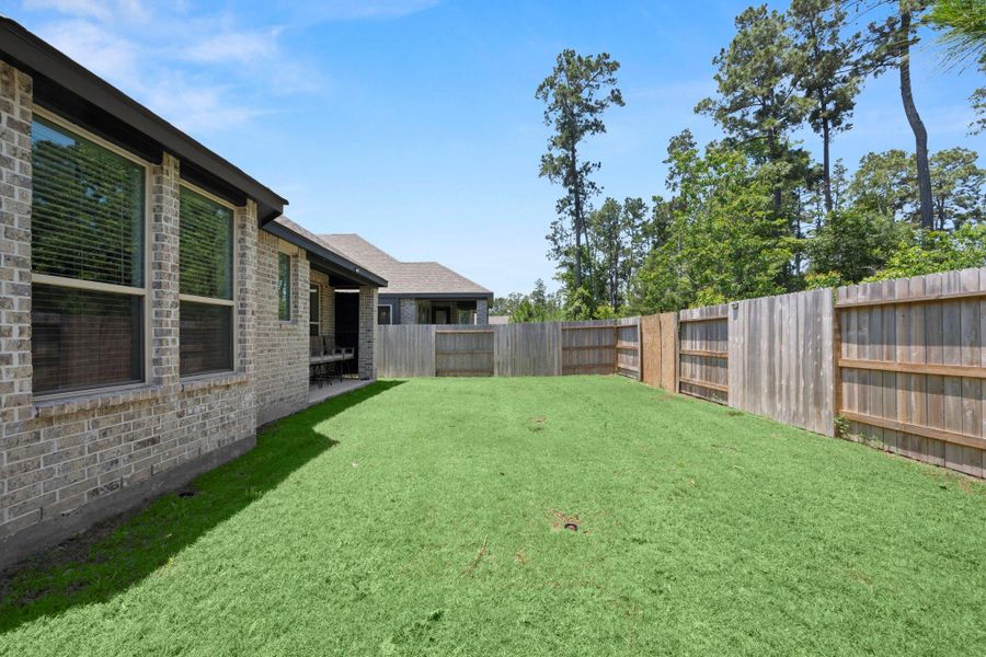 Exterior details and patio area of a home in Evergreen, Conroe (Image 21). Exterior details and patio area of a home in Evergreen, Conroe (Image 21).