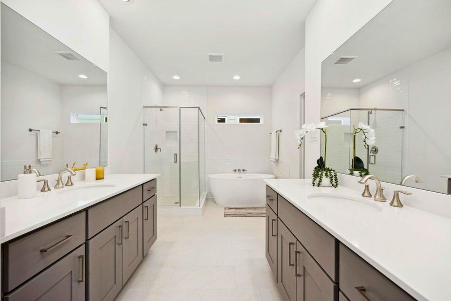 Morning routines just leveled up. Dual vanities, quartz counters, soft lighting—and enough space for two people to actually get ready in peace. Morning routines just leveled up. Dual vanities, quartz counters, soft lighting—and enough space for two people to actually get ready in peace.