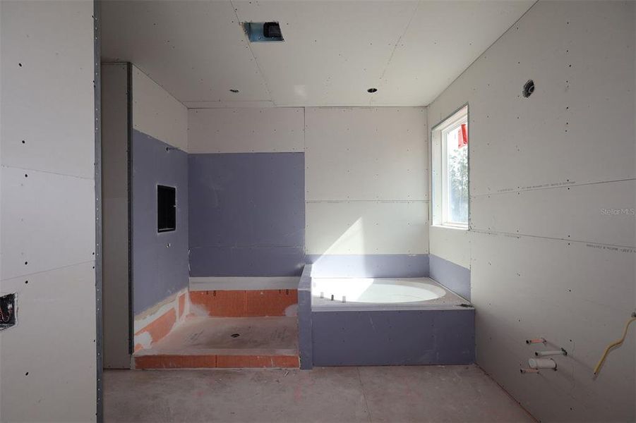 In-progress construction of a new home in Eden at Crossprairie, St. Cloud, FL (Image 23).