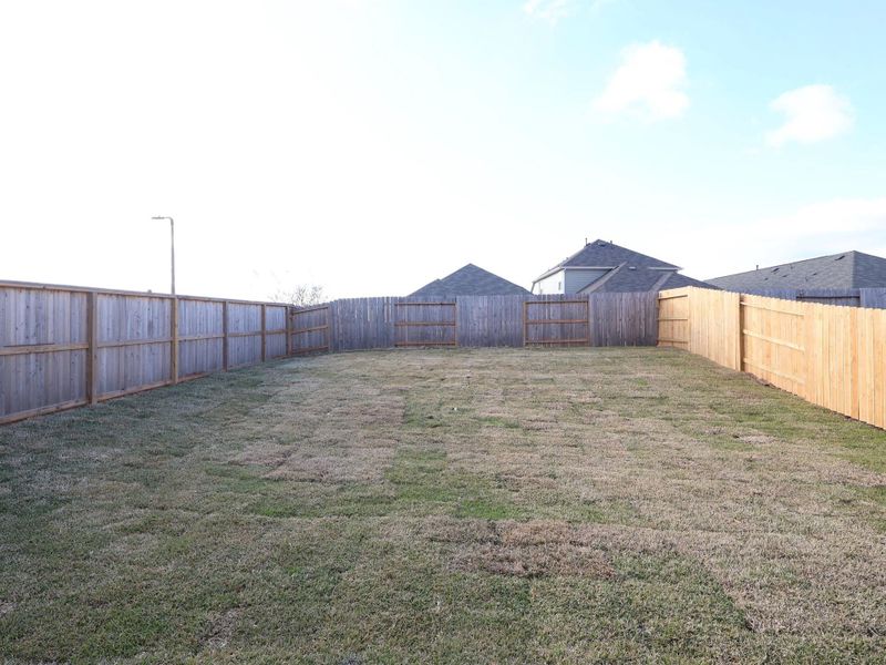 Exterior details and patio area of a home in Lone Star Landing, Montgomery (Image 22).
