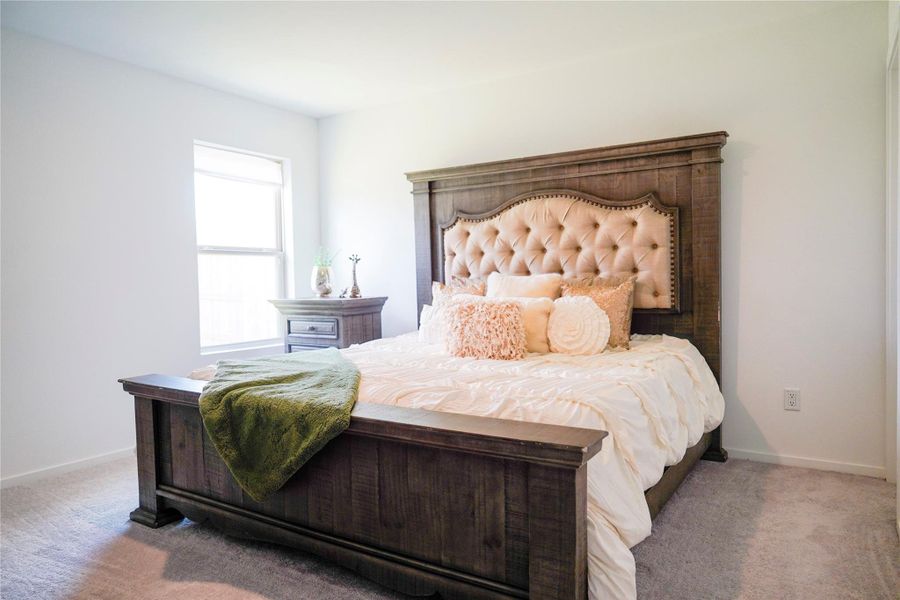 Furnished interior view inside a new home in Sunterra, Katy (Image 8).