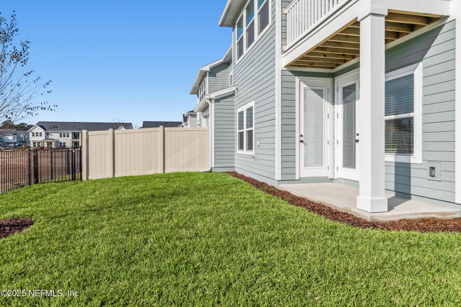 Exterior details and patio area of a home in Kettering at eTown - Traditional Collection, Jacksonville (Image 3).