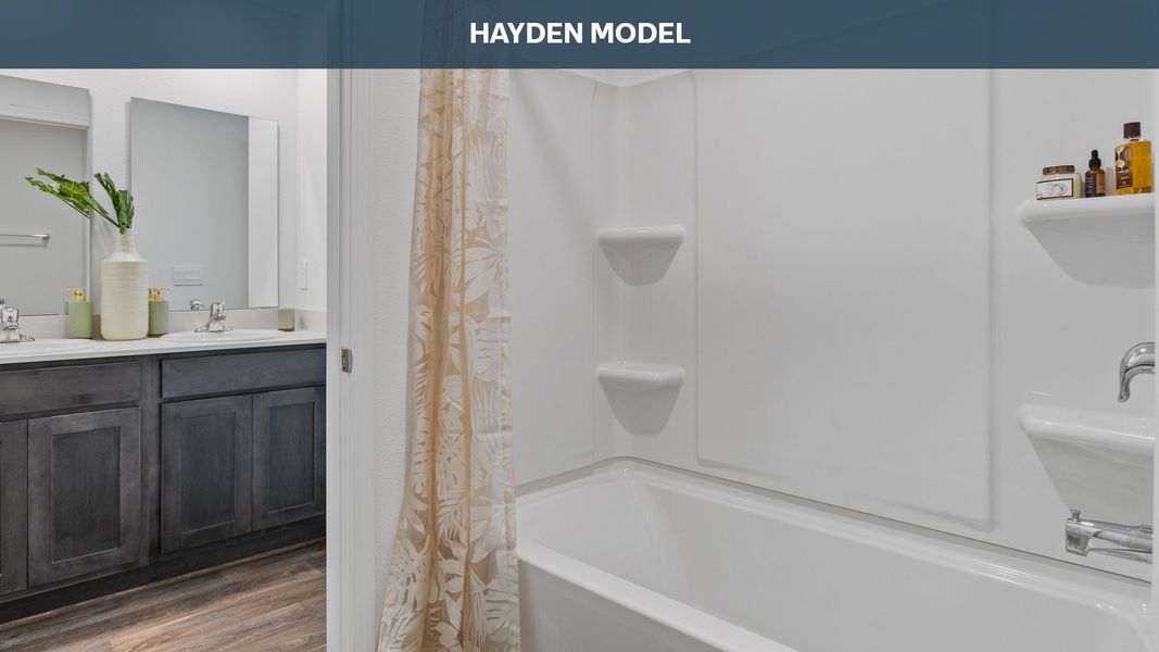 Representative furnished interior of a home built from the HAYDEN by D.R. Horton in Entrada, St. Augustine (Image 16).