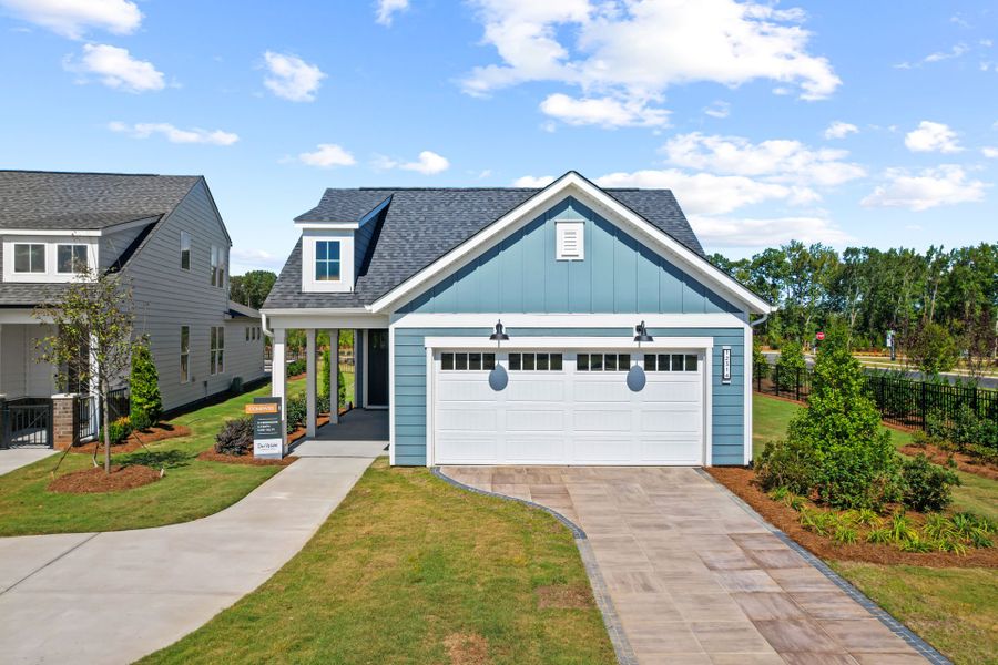 Representative exterior photo of a completed home built from the Compass by Del Webb in Del Webb Carolina Ridge, Midland, NC (Image 29).
