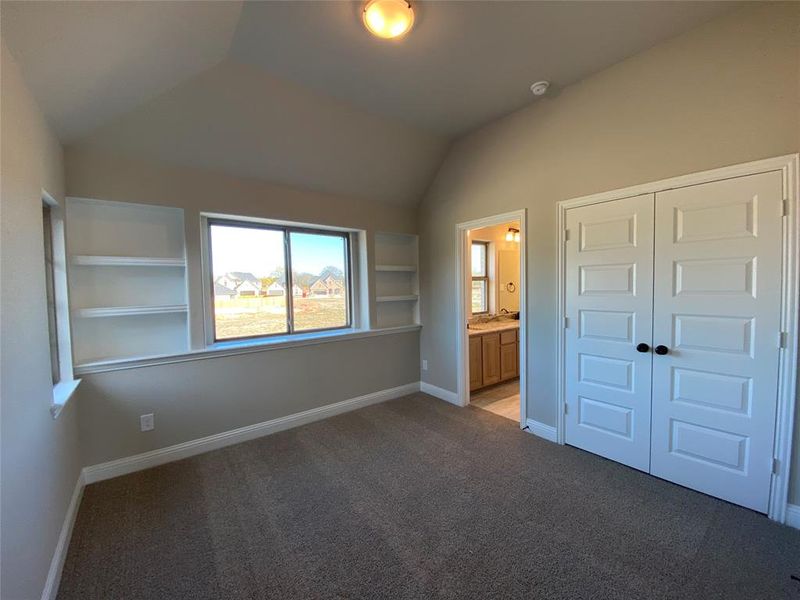 Bed 5 has vaulted ceiling, built-in shelves, and shares a Jack & Jill bath Bed 5 has vaulted ceiling, built-in shelves, and shares a Jack & Jill bath