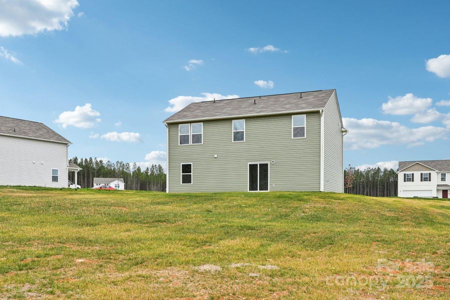Exterior details and patio area of a home in The Pines at Stoney Point, Lexington (Image 4).