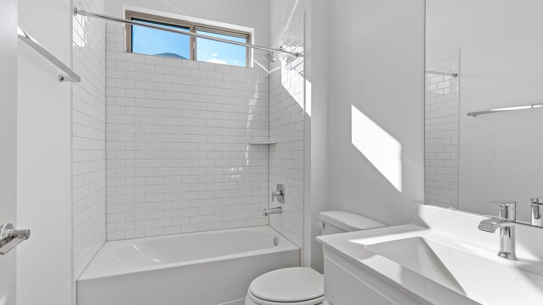 Representative furnished interior of a home built from the Plan by D.R. Horton in Davis Harbor, League City (Image 7).