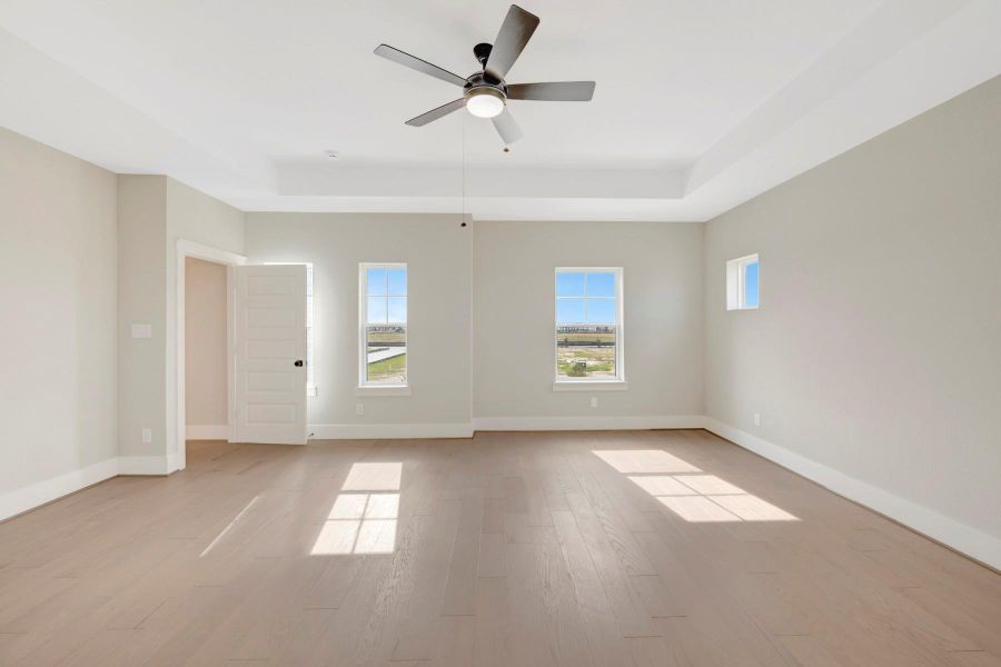 Spacious, unfurnished interior of a new home in Easthaven at Bridgeland Central - Vision Collection, Cypress (Image 34).