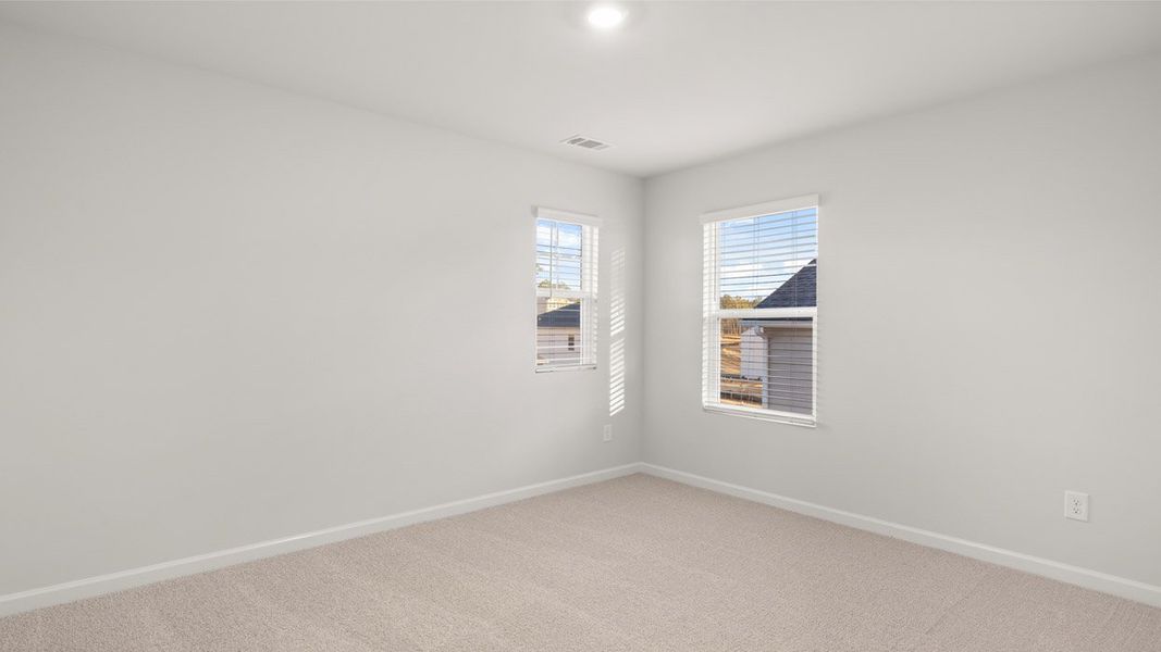 Spacious, unfurnished interior of a new home in Southwind Village, Evans (Image 41).