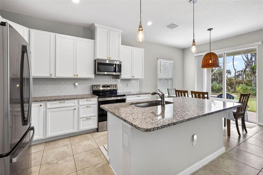 Furnished interior view inside a new home in Summerwoods, Parrish (Image 38).