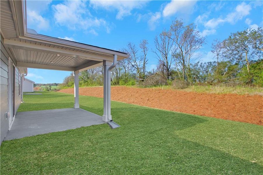 Exterior details and patio area of a home in Heritage Grove 2-Story, Calhoun (Image 3).