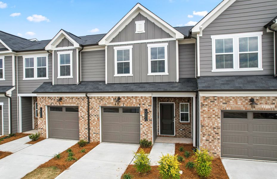 Front exterior of a new home in Mallard Park, Charlotte, NC, highlighting curb appeal (Image 25). Front exterior of a new home in Mallard Park, Charlotte, NC, highlighting curb appeal (Image 25).
