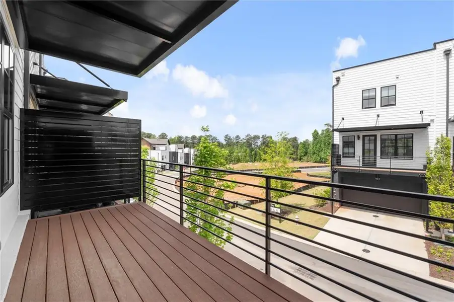 Exterior details and patio area of a home in The Gathering – Alpharetta, Alpharetta (Image 4).