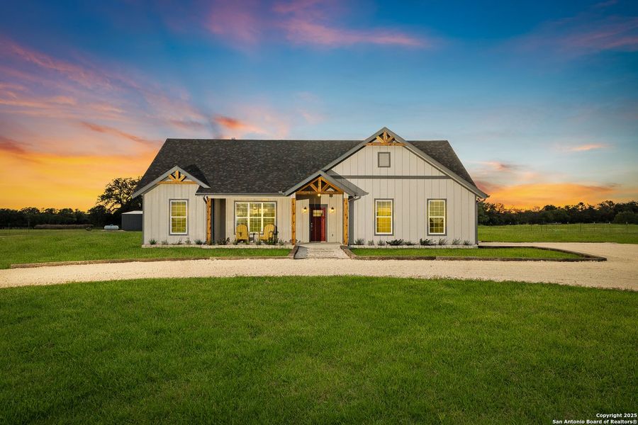 Front exterior of a new home in , Hondo, TX, highlighting curb appeal (Image 25). Front exterior of a new home in , Hondo, TX, highlighting curb appeal (Image 25).