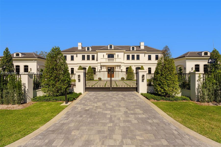 Front exterior of a new home in , Pinecrest, FL, highlighting curb appeal (Image 17).