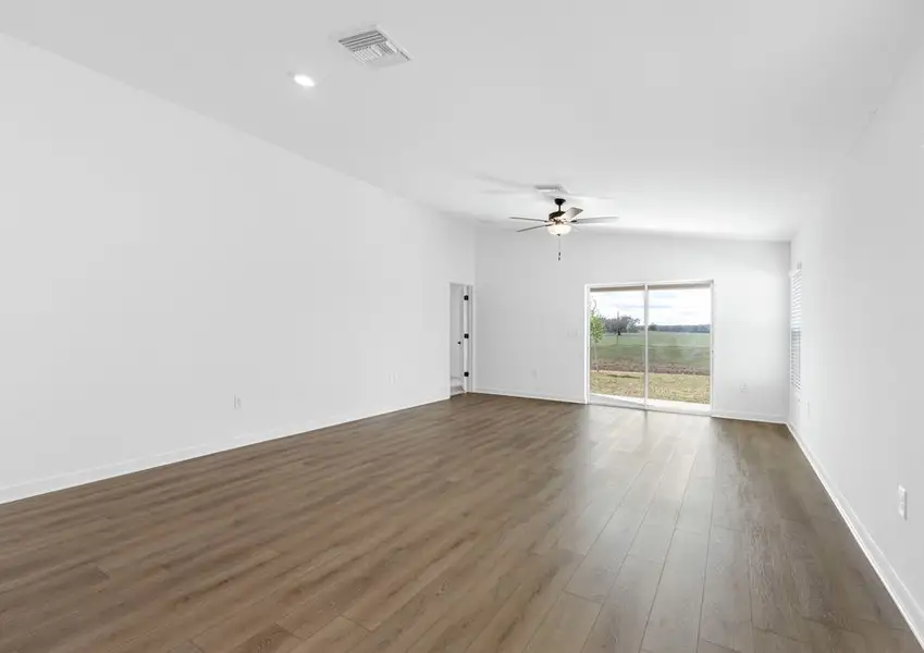 The family room lets in plenty of bright, natural light