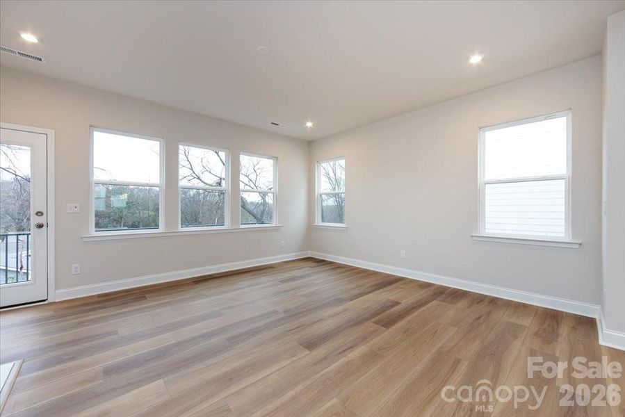 Light Filled Living Room with Added End Unit Windows