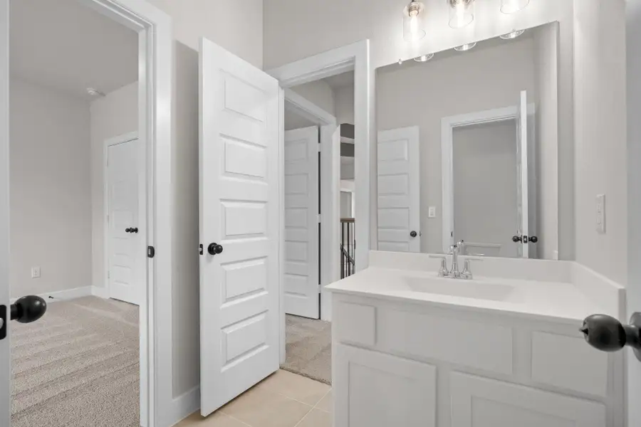 Furnished interior view inside a new home in Santa Rita Ranch - 60', Liberty Hill (Image 9). Furnished interior view inside a new home in Santa Rita Ranch - 60', Liberty Hill (Image 9).