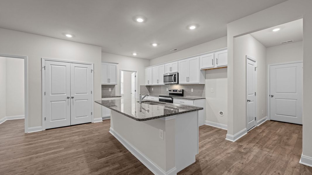 Furnished interior view inside a new home in Tyler - Home on the Lake, New Bern (Image 4).