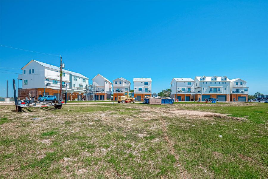 Front exterior of a new home in , Taylor Lake Village, TX, highlighting curb appeal (Image 7).