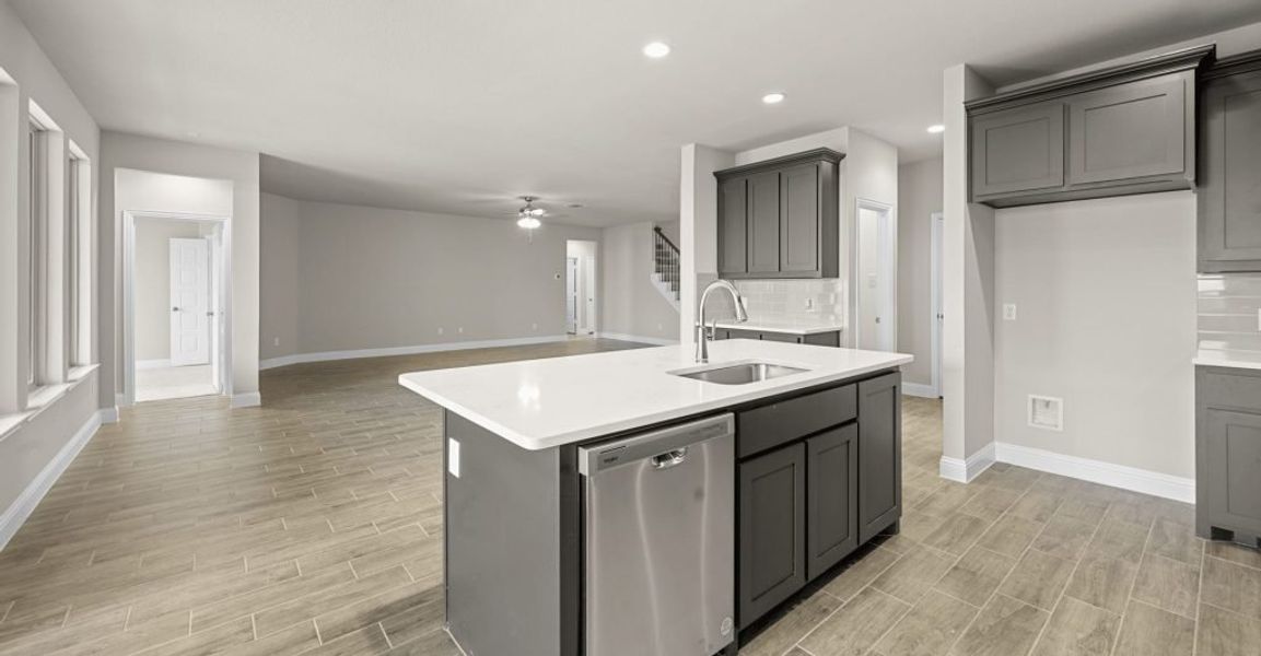 Representative exterior photo of a completed home built from the Donnington by Impression Homes in Still Water Lake, Godley, TX (Image 7).