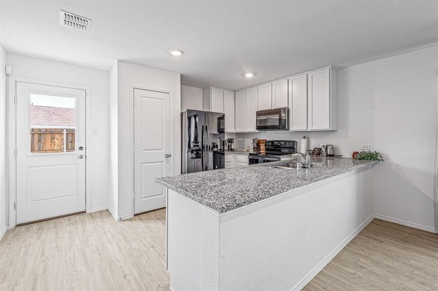 Furnished interior view inside a new home in South Oak Grove: Cottage Collection, Fort Worth (Image 21). Furnished interior view inside a new home in South Oak Grove: Cottage Collection, Fort Worth (Image 21).