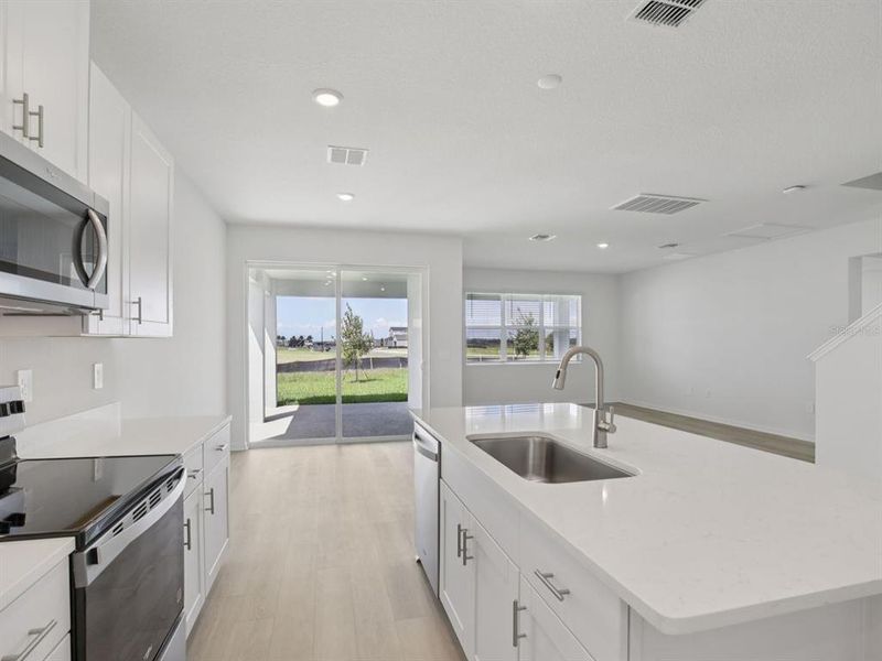 Furnished interior view inside a new home in Coasterra - Reserve Series, Palmetto (Image 5).