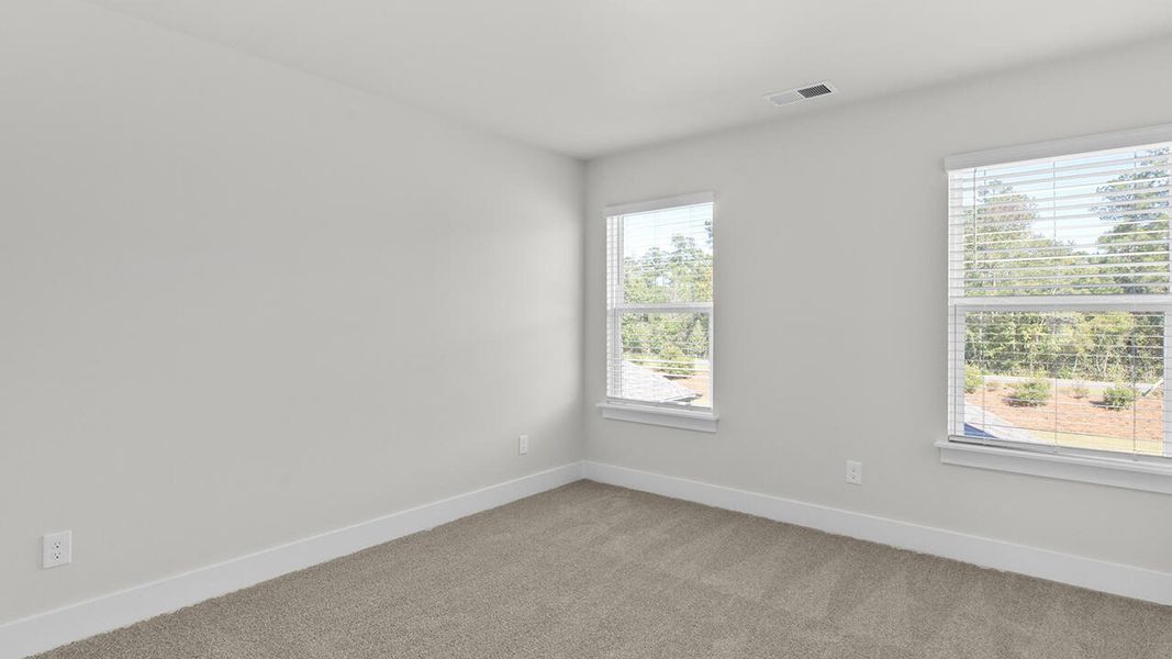 Spacious, unfurnished interior of a new home in Indigo Preserve, Leland (Image 32).
