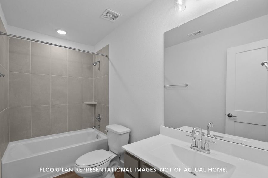 Furnished interior view inside a new home in Lone Star Landing, Montgomery (Image 12).