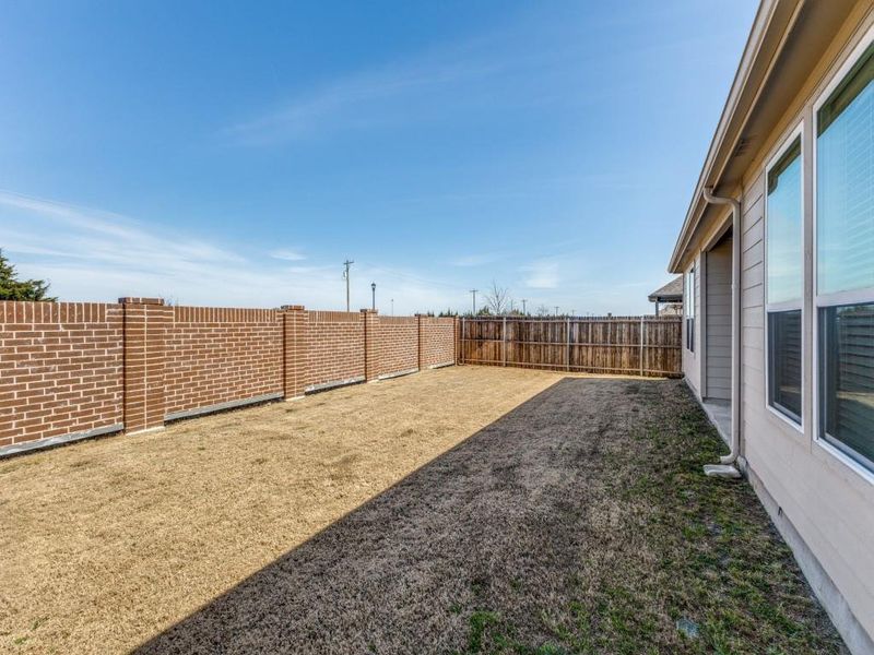 Exterior details and patio area of a home in Woodcreek, Fate (Image 19).
