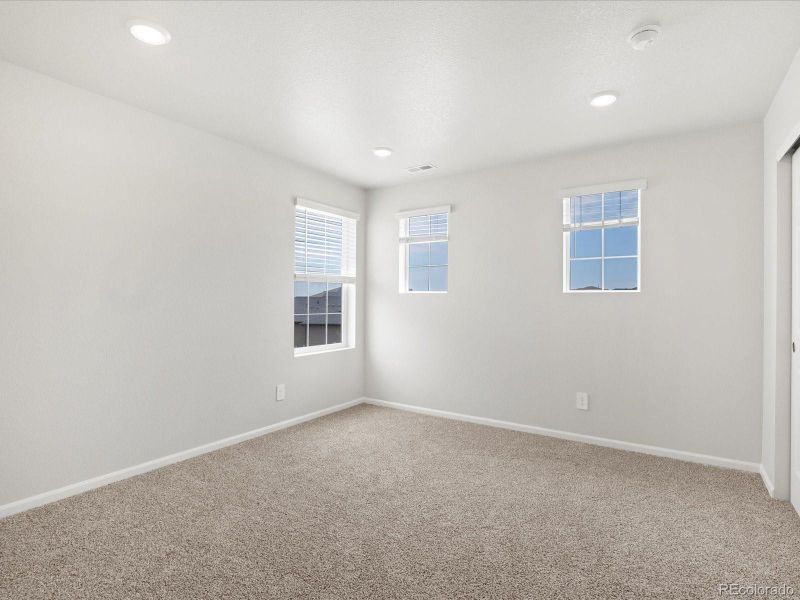 Spacious, unfurnished interior of a new home in Buffalo Highlands: The Canyon Collection, Commerce City (Image 25).