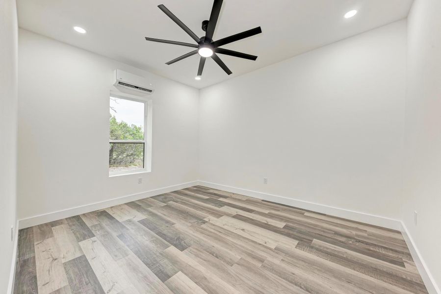 Bedroom in guest apartment off garage-virtually staged