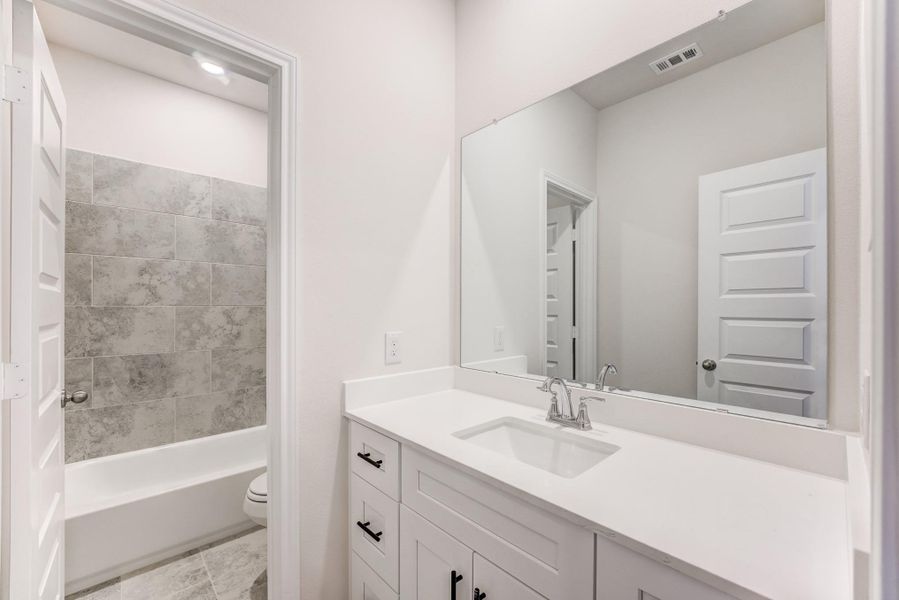 Furnished interior view inside a new home in Townsen Landing, Humble (Image 14).