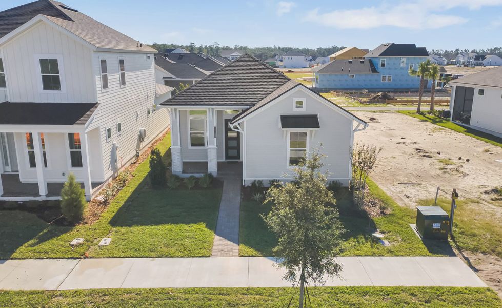 Front exterior of a new home in Seven Pines, Jacksonville, FL, highlighting curb appeal (Image 15).